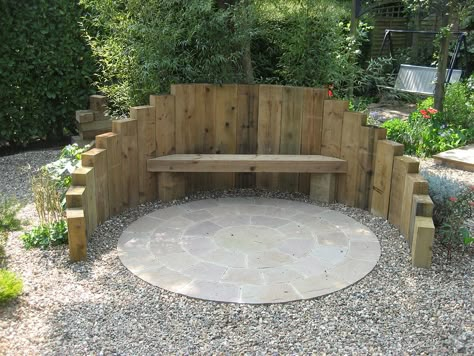 sleeper retained firepit seating area with indian sandstone circle kit | by applefields_landscaping Fire Pit Seating Area, Garden Seating Area, Railway Sleepers, Backyard Seating, Back Garden Design, Fire Pit Seating, Garden Screening, Gravel Garden, Fire Pit Backyard