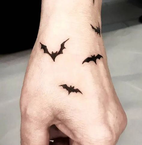 47 Exciting Bat Tattoo Ideas You Should Save For Your Next Tattoo - Psycho Tats Bats On Hand Tattoo, Bats Hand Tattoo, Bat Tattoo On Wrist, Hand Bat Tattoo, Vampire Hand Tattoo, Bat Hand Tattoos For Women, Bat Tattoo On Hand, Tiny Bats Tattoo, Bat Tattoo Wrist