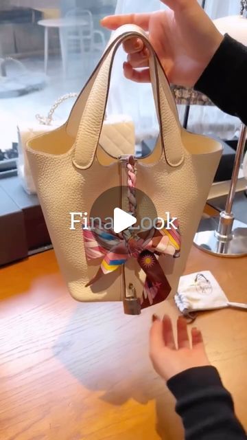 Most Creative Bag Accessories | EST. 2019 🇨🇦 on Instagram: "Easy Scarf Bag Accessory - add pretty bow using Twilly
 to any bag! 

Want to see more bag conversion ideas? Save this video and 👣 Follow for more luxury bag hacks, tricks, & tips.

#howtomake  #hermespicotin #scarfhack #twilly #bagaccessories" Twilly Scarf Bags, Purse Wishlist, Bag Hacks, Scarf Bag, Creative Bag, Twilly Scarf, Luxury Purses, Luxury Bag, Twilly