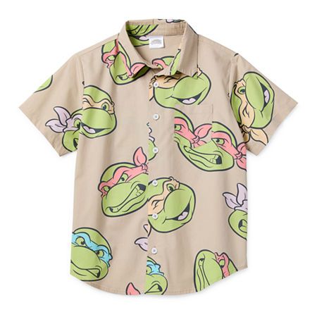 Tailor your little or big boy's wardrobe for an action-packed day with this Teenage Mutant Ninja Turtle printed button-down shirt. It's made from soft cotton-poplin with a spread collar, chest pocket, short sleeves, and a curved hem for easy layering. Pair it with everything from trousers, joggers, or shorts.Character: Teenage Mutant Ninja TurtlesClosure Type: ButtonFit: Regular FitNeckline: Collar NeckPockets: 1 Front Slip PocketSleeve Length: Short SleeveFiber Content: 100% CottonFabric Descri Ninja Turtle 1st Birthday Party, Ninja Turtle Backdrop, Teenage Mutant Ninja Turtle Party, Ninja Turtle Birthday Shirt, Ninja Turtles Birthday Party Ideas, Ninja Turtle Theme Party, Ninja Turtle Theme, Turtle Birthday Parties, Tmnt Birthday