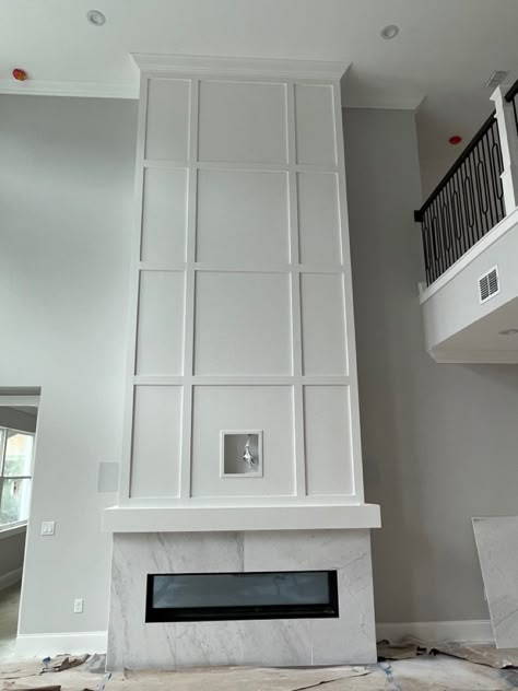 Two Story Fireplace Accent Wall, Electric Fireplace High Ceiling, Wainscoting Fireplace Wall With Tv, Fireplace Flat Wall Ideas, Floor To Ceiling Fireplace With Tv, High Ceiling Wall Decor, Fireplace Tall Ceilings, Tall Fireplace Wall High Ceilings, Fireplace Wainscoting