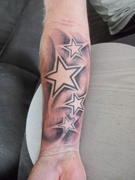 Star Tattoo Men Arm, Leg Star Tattoos, Shaded Stars Tattoo, Shooting Star Tattoo Men, Star Tattoo Designs For Men Guys, Star Tattoos Men, Fire Tattoo For Men, Shoot For The Stars Tattoo, Stars Tattoo For Men