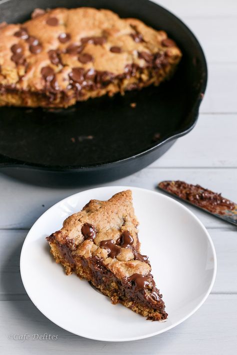 The best buttery and gooey on the inside Nutella stuffed deep dish chocolate chip skillet cookie will have you weak at the knees wanting more! Nutella Cookie, Skillet Chocolate Chip Cookie, Skillet Cookie, Nutella Cookies, Nutella Recipes, Easy Cookie Recipes, Chocolate Chip Cookie, Deep Dish, Cookie Cake