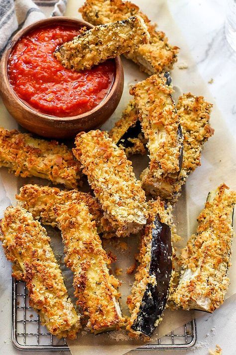 The cheesy flavor and crispy crust on these eggplant "fries" is just like fried eggplant Parmesan, but with a fraction of the oil. They're the perfect appetizer for Italian night! Dip these crispy fries into a big hot bowl of your favorite marinara. #vegetables #vegetablerecipes #vegetabledishes #healthyrecipes Crispy Eggplant Parmesan, Best Eggplant Recipe, Eggplant Fries, Crispy Eggplant, Parmesan Fries, Zucchini Pizza Bites, Fried Eggplant, Fresh Tomato Salsa, Eggplant Parmesan