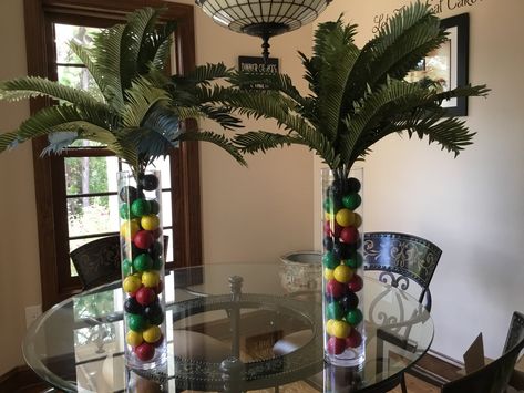 Jamaican Party Decorations Diy, Rasta Centerpieces, Reggae Party Ideas Decoration, Jamaica Decor, Reggae Theme Party, Juneteenth Decoration Ideas, Rasta Birthday Party Decoration, Reggae Decorations Ideas Rasta Party, Rasta Wedding