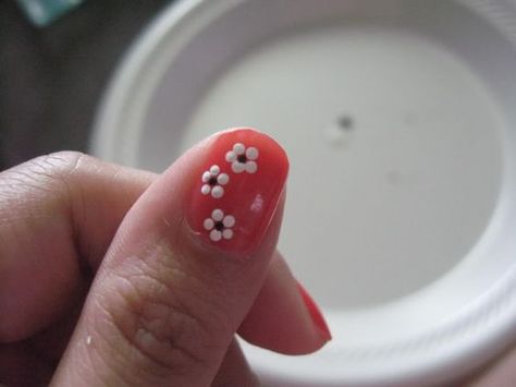 How to Do Nail Flowers | Using your tooth pick, add small black dots. Dip the toothpick only ... Daisies On Nails, Drawing Daisies, Toothpick Nail Art, Nail Flowers, Doing Nails, Tooth Pick, Art At Home, Nail Art At Home, Throw Back