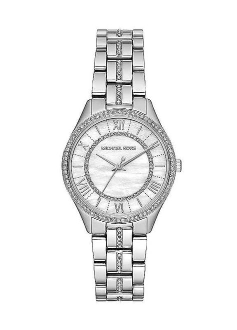 This Michael Kors is a classy ladies watch. A stainless steel case encloses a quartz movement set behind a white mother of pearl dial. The watch fastens with a silver, stone set bracelet and a fold-over deployment clasp. This watch is 50 metres water resistance will allow you to use this watch for swimming but its not guaranteed to be resistant to jumping into the pool. Brand: Michael Kors 50 metres water resistance Michael Kors Watches Women, Silver Womens Watch, Watch Expensive, Trendy Jewelry Ideas, Michael Kors Watch Silver, Watches Women Michael Kors, Classy Watch, Silver Watches Women, Set Bracelet