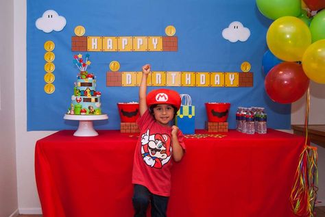 Super Mario Bros 5th Birthday  | CatchMyParty.com Super Mario Background Birthday Party Ideas, Super Mario Birthday Party Backdrop, Mario Brother Decorations, Super Mario Brothers Movie Party, Mario Happy Birthday Banner, Mario Bros Birthday Party Ideas, Nintendo Party, Super Mario Bros Birthday Party, Mario Bros Birthday