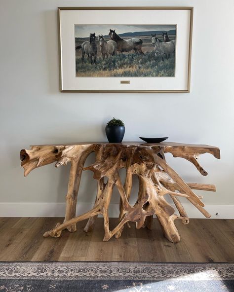 📸: jillvannoyinteriors Tremont Console Table One-of-a-kind design: Let our natural teak root console, crafted from reclaimed teak wood, introduce an organic shape to your decor. We use it as an ideal counterpoint to clean modern scenes. Note the contrast of the bark's natural lighter color with the dark flat areas where the root was cut and smoothed. Each root is unique; No trees were cut down to obtain the roots, which were reclaimed from trees sustainably harvested for lumber. Teak Root Console, Modern Scene, Entryway Style, Console Table Styling, Washable Slipcovers, Mitchell Gold Bob Williams, Mitchell Gold, Coffee And Cocktail Tables, Design Advice