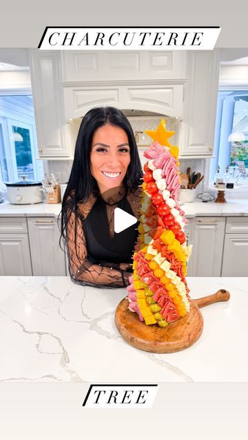 Carla Bushey - Always keepin’ it real on Instagram: "Let’s change things up with this Charcuterie Tree. Grab your favorite meats, cheeses and other antipasto favorites and let’s make the Holidays as festive as they can be 🙌🏻
.
Comment the word TREE and I’ll send you the 🔗 for what I used to your messages! Including the outfit 😉
.
Ingredients: 
* 1 tall foam cone (mine is 4.75” x 17.9” but a 14.65” x 15.7” will work too!)
* Aluminum foil to wrap the cone
* Toothpicks (to attach all the ingredients to the cone
* 1 pint of cherry tomatoes
* 1 pint of yellow baby tomatoes
* 1-8oz tub baby fresh mozarella
* 8oz of salame
* 8oz of capiccola
* 8oz of pepperoni 
* 1-8oz block of cheddar cheese (cut in cubes)
* 1-8oz block of pepperjack cheese (cut in cubes)
* 1-8oz jar/can of artichokes
* 1-6o Charcuterie Tree, Carla Bushey, Pepperjack Cheese, Toothpick Appetizers, Christmas Tree Food, Baby Tomatoes, Thanksgiving Cooking, Appetizers Easy Finger Food, Czech Recipes