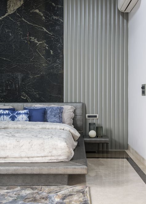 The son’s bedroom embraces a minimal design in a stark shift from the opulence brimming in the rest of the house. Grey walls, with Prussian blue accents use in furnishings. Neoclassical Design, Grey Bedroom, Neoclassical, Grey Walls, Blue Accents, Daybed, Minimal Design, Bedroom Design, Bedroom