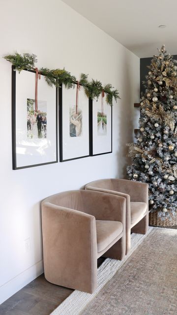 Garland Above Picture Frame, Hanging Pictures With Ribbon Wall Art, Decorating Picture Frames For Christmas, Christmas Picture Decoration Ideas, Garland Over Picture On Wall, Wrapped Frames On Wall Christmas, Christmas Bow On Mirror, Bows On Picture Frames Christmas, Picture Frame Hanging Ideas