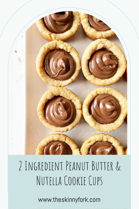 Who wants some 2 Ingredient Peanut Butter & Nutella Cookie Cups? These are easy peasy peanut butter cookie cups that are stuffed with hazelnut spread and perfect to enjoy as a sweet snack! TheSkinnyFork.com | Skinny & Healthy Recipes Nutella Peanut Butter Recipes, Nutella Cookie Cups, Peanut Butter Nutella Cookies, Peanut Butter Cookie Cups, Nutella Cookie, Nutella Recipes Easy, Butter Cookie Dough, Peanut Butter Nutella, Nutella Spread