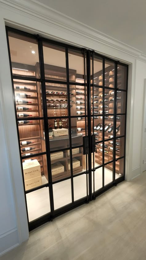 Modern custom metalwork doors for a Southampton residence. Modern Wine Room, Wine Room Doors, Modern Wine Room With Glass Doors, Wine Room Modern Glass Doors, Glass Doors For Wine Cellars, Wine Cellar Glass Doors, Glass Wine Cellar, Room Doors, Wine Room