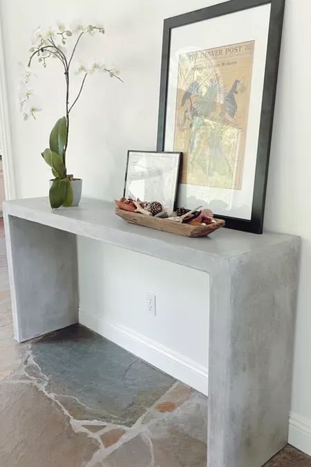 This exact console table is from Terra Outdoor Living and can’t be linked here BUT I did link one from Wayfair that is very similar. #consoletable #wayfair #entryway #concretetable #LTKhome Concrete Console Table Entryway, Plaster Entry Table, Marble Console Tables, Cement Console Table, Concrete Entry Table, Diy Concrete Console Table, Stone Entry Table, Stone Entryway Table, Marble Entry Table