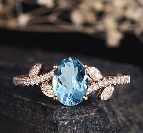 ✔ PRODUCT INFORMATION Material: Brass Gemstone: Lab-Created Sky Blue Topaz Mainstone Size: 6x8 mm Ring Weight: 3 gram Size: 6,7,8,9,10 US 🖤 It's dainty and can be worn every day 🖤A special piece you'll treasure 🖤 High-quality materials and attention to detail ✔Occasion: Dating / party / wedding / anniversary/propose ✔ 100% HANDMADE Each item handmade individually. ✔TURN AROUND TIME ♦️️All items are custom-made to order. Our turnaround time is about 7 - 10 business days. This can be changed du Rose Gold Halo Ring, Sky Blue Topaz Ring, Emerald Ring Gold, Engagement Ring Size, Gold Color Ring, Aquamarine Engagement Ring, Wedding Engagement Ring, Engagement Ring Sizes, Rose Engagement Ring