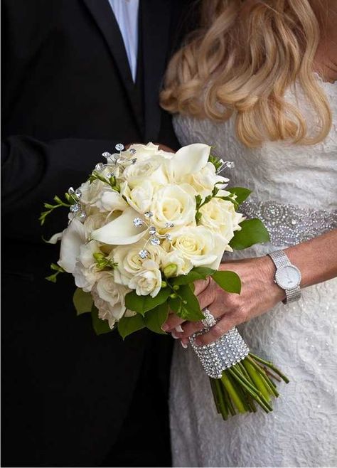 Unique Floral Expressions - Flowers - Atlanta, GA - WeddingWire Bridal Bouquet With Rhinestones, Wedding Bouquets Sparkle, Bridal Bouquet Cala Lily, Bling Bridal Bouquet, Rhinestone Bridal Bouquet, Crystals Bouquet, Cala Lilies, Vintage Rose Bouquet, Lily Bridal Bouquet