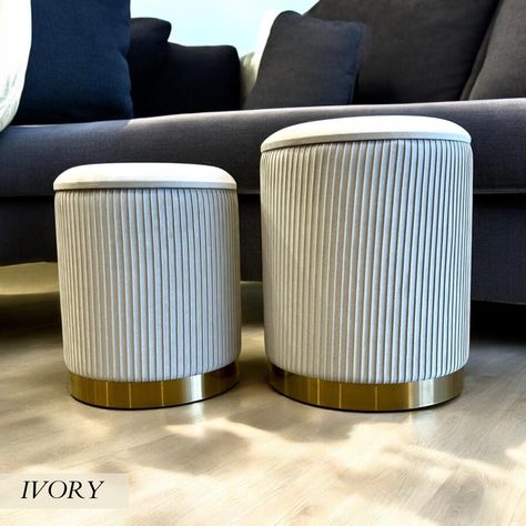 Unveil a touch of elegance and functionality with our Velvet Storage Foot Stools. This versatile pouffe is a masterful blend of style and utility, presenting a lush padded seat that invites you to unwind and indulge in comfort.  Lift the removable lid to discover a generous storage capacity, perfect for tucking away your cherished items with ease. Serving dually as a graceful foot rest or a sophisticated pouf at the vanity, its vibrant velvet and metallic hues create a stunning visual harmony.  Whether it's stationed in your living room or beside your dressing table, this footstool is more than just a seat; it's a statement piece that elevates your interior while keeping everyday clutter neatly concealed. Experience the allure and convenience of this exquisite vanity stool, where style mee Vanity Stool, Foot Stool, Functional Storage, Dressing Table, Storage Space, Living Furniture, Living Room Furniture, Storage Spaces, Ottoman