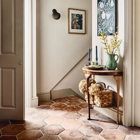 Our Terracotta style porcelain floor tiles are evocative of warm Spanish evenings. Styled here in a unique hexagon pattern for interest, the durable porcelain tile is suitable for indoor and outdoor use, scratchproof, waterproof, stainproof and dog or child friendly. Terracotta Entryway Tile, Terracotta Tiles Hallway, Citadel Paint, Yellow Painted Walls, Hallway Tiles Floor, Terracotta Floor Tiles, Terracotta Floors, Autumn Street, Tiled Hallway