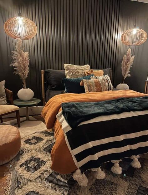 Black Dresser Bedroom Ideas Bohemian, Guest Bedroom Ideas Bohemian, Black And Gold Boho Bedroom, Black And Burnt Orange Bedroom Ideas, Black And Rust Bedroom Boho, Moody Western Living Room, Black And Burnt Orange Bedroom, Rust Colored Bedding, Orange And Black Bedroom