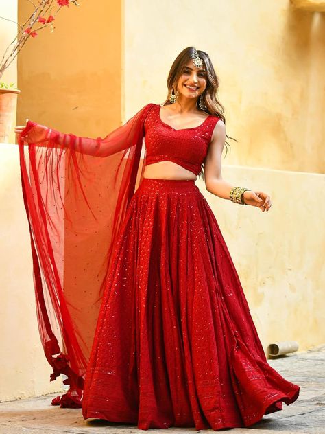 Beautiful sequined georgette lehenga choli for women. Perfect for weddings and parties. #indianwear #lehenga #fashion Red Saree Outfit, Red Lehenga Simple, Red Lehenga Designs, Lehenga Simple, Lehenga Half Saree, Saree Outfit, Lehenga Choli Latest, Chikankari Lehenga, Simple Frock