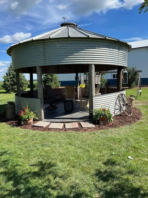 Metal Grain Bin Gazebo, Backyard Silo Ideas, Grain Bin Fire Pit Outdoor Fireplaces, Corn Crib Gazebo Ideas, Binzebo Ideas, Pool Hillside, Silo Gazebo, Grain Bin Gazebo, Silo Ideas