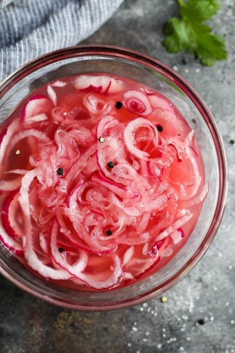 Making a simple batch of Quick Pickled Onions is the easiest way to elevate any meal. Made with red onions, apple cider vinegar, salt and peppercorns, these easy homemade pink pickles are gluten-free and Whole30. Our easy no-fail photo tutorial will help you make a batch of quick pickled red onions! Quick Pickled Red Onions, Quick Pickled Onions, Flavor Enhancers, Pickled Red Onions, Pickled Onions, Onion Recipes, Pickling Recipes, Red Onion, Grain Free