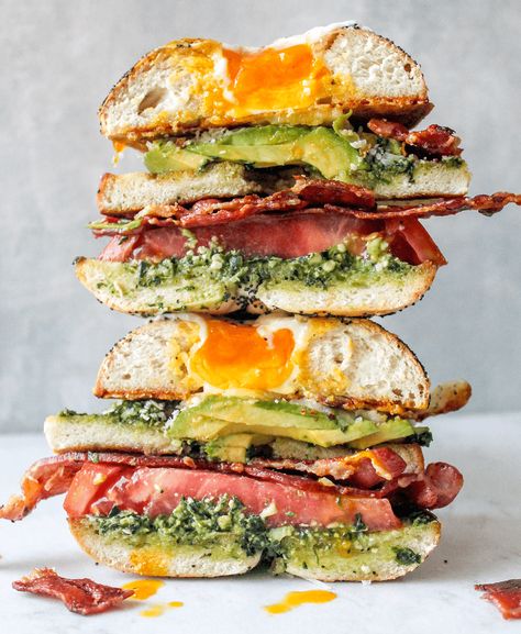 Ultimate Bagel Breakfast Sandwich with Pesto - bon abbetit Bagel Breakfast Ideas Healthy, Bagel Sandwich Photography, Lox Breakfast Ideas, Breakfast Sandwich Photography, Sandwich Food Styling, Bagel Photography Food Styling, Bagel Recipe Sandwich, Spring Sandwiches, Deli Sandwich Recipes