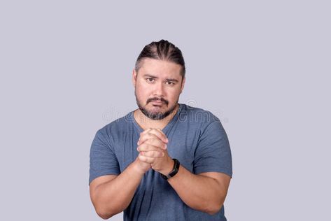 A man pouts while begging for forgiveness or pleading for help. Clasping his hands together to express the urgency royalty free stock image Begging For Forgiveness, Hands Together, Stock Photography Free, His Hands, Stock Images Free, Stock Photography, A Man, Royalty, Stock Images