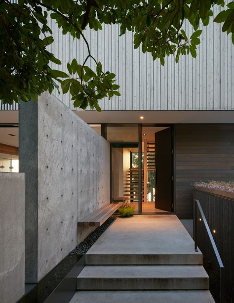 Fauntleroy Residence by Heliotrope is a "private oasis" in Seattle Sliding Pocket Doors, Seattle Homes, Midcentury Home, West Seattle, Wood Cladding, Concrete Steps, Storey Homes, Front Entrance, Puget Sound