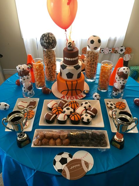 Sports Birthday Theme - Dessert Table for Ayden's 2nd Birthday - basketball baseball soccer football - sports cupcake - sports cookies - champion - balls - sweet table Sport Cupcakes, Baby Shower Games Coed, Sports Baby Shower Theme, Sports Baby Shower, Basketball Birthday Parties, Sports Theme Birthday, Ball Birthday Parties, Boy Baby Shower Ideas, Sports Birthday Party