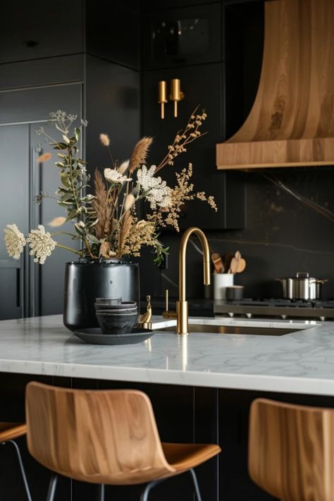 Stunning black and gold kitchen design inspiration featuring elegant cabinets, luxurious gold accents, and stylish decorative accessories. This pin captures the essence of modern luxury kitchens. Black Gold Marble Kitchen, Kitchen Design With Black Appliances, Black And Gold Appliances Kitchen, Gold Fixtures Kitchen, Black And Gold Kitchen Decor, Black White Gold Kitchen, Black And Gold Kitchen Ideas, Black White And Gold Kitchen, Black And Gold Interior Design