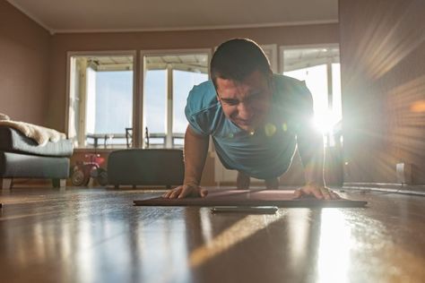 Young men exercising at home. Men Exercising, Exercising At Home, Conditioning Training, Men Exercises, Home Photography, Go To The Gym, Reverse Lunges, The Body Book, Major Muscles