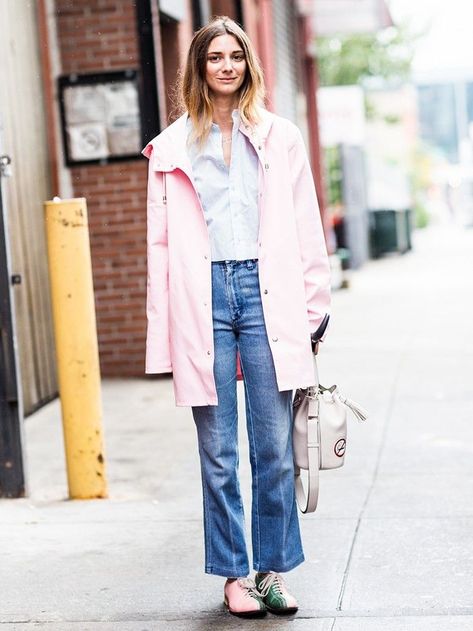 How to Dress When It's Hot AND Rainy Outside via @WhoWhatWearUK Hot And Rainy Weather Outfits, Pink Raincoat Outfit, Summer Rain Outfit, Rains Raincoat, Rainy Weather Outfits, Stutterheim Raincoat, Cute Raincoats, Hot Weather Outfits, Pink Raincoat