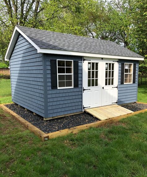 Cottage Storage Shed, Painted Storage Shed, Shed Planting Ideas, Behind Shed Ideas, Border Around Shed, Blue Shed Ideas, Blue Shed Colors, Outdoor Shed Color Ideas, Outdoor Shed Colors