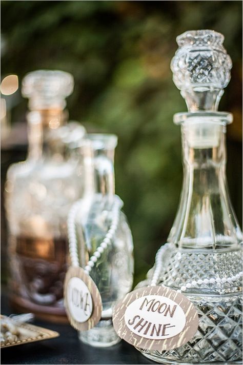 label vintage bottles #roaring20wedding #cocktailstation #weddingchicks http://www.weddingchicks.com/2014/01/02/easy-roaring-20s-wedding-ideas/ Vintage Bottles Wedding, Art Deco Wedding Inspiration, Roaring 20s Wedding, 20s Wedding, Roaring 20s Party, Gatsby Theme, Great Gatsby Wedding, Great Gatsby Party, 1920s Wedding