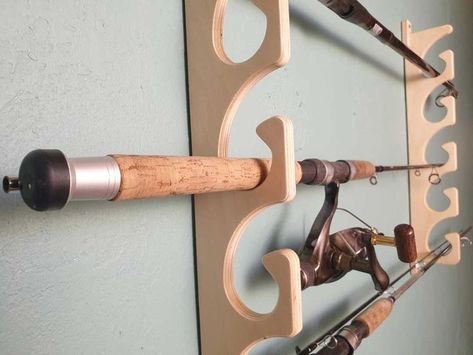 Very nice and clever way of storing fishing rods. Fishing Rod Stand, Garage Organizing, Ceiling Hangers, Hook Knot, Fishing Pole Holder, Fishing Rod Rack, Rod Rack, Garage Organize, Hanger Organizer