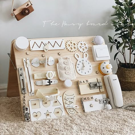 Baby Busy Board Diy Accessories Montessori Education Games Kids Learning Skill 🔆 #MontessoriBed #ChildFurniture #ToddlerRoomDecor #NaturalMaterials #WoodenToys #KidsRoomInspiration #MontessoriHome #EcoFriendlyKids #ToddlerSleep #ParentingIdeas Baby Busy Board Diy, Baby Busy Board, Baby Activity Board, Diy Busy Board, Handmade Kids Toys, Busy Board Baby, Education Games, Baby Toys Diy, Busy Boards For Toddlers