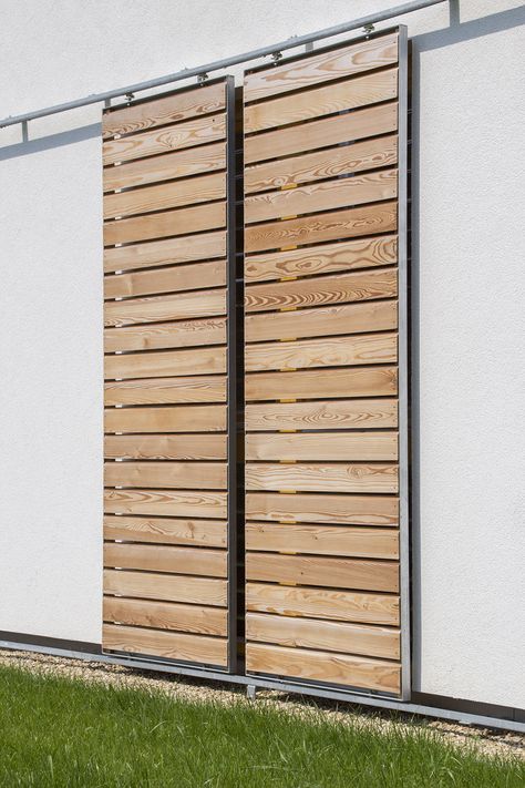 Mid Century Modern Door, Outdoor Shutters, Sliding Doors Exterior, Sliding Shutters, Wooden Sliding Doors, Exterior Wall Tiles, Diy Shutters, House Cladding, House Exterior Colors Schemes