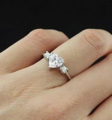 Round 3 Stone Engagement Ring, Heart Shaped Wedding Rings, Flower Diamond Engagement Ring, Non Diamond Engagement Rings, Heart Cut Ring, Beautiful Wedding Rings Diamonds, Heart Shaped Diamond Ring, Heart Shaped Engagement Rings, 3 Stone Engagement Ring