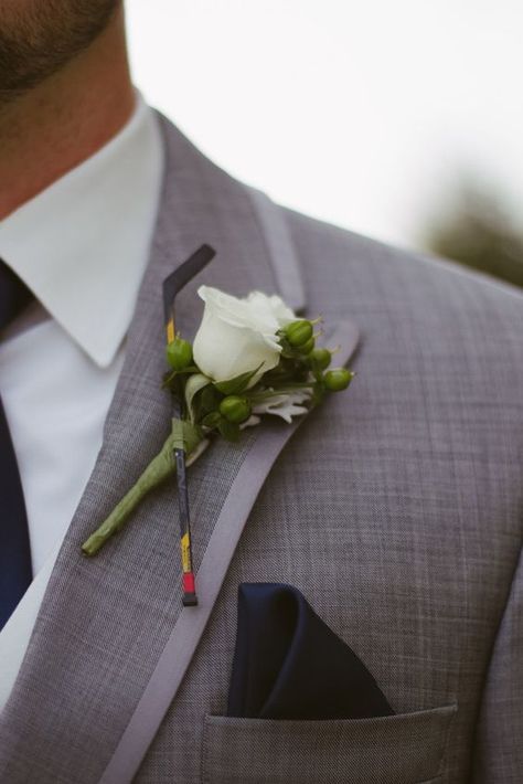 hockey stick boutonniere #hockeyweddingtheme #hockeyweddingideas #hockeyweddingphotos #hockeyweddingevents #hockeyweddingdecorations #hockeyweddingcenterpieces #hockeyweddingcake #hockeywedding favors #icehockeywedding #hockeyweddingdress #hockeyweddinginvitations #hockeyweddingring #hockeyweddingreception #fieldhockeywedding #hockeyweddingshower Hockey Boutonniere, Hockey Wedding Ideas, Hockey Wedding Photos, Hockey Wedding Theme, Hockey Wedding Cake, Hockey Engagement Photos, Boutonniere White, Hockey Wedding, Sports Themed Wedding