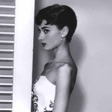 Audrey Hepburn Eternally on Instagram: "Audrey Hepburn photographed at Paramount Studios for Sabrina, 1953.  DM 📨 for credits/ removal  ❤ If you liked 💬 Say what you thinking ⬇️ Save to see whenever you want 📲 Share with your friends ✅ Follow to much more  #audreyhepburn #classichollywood #classicicons #classicmoviestars #classylady #goldenageofhollywood #oldhollywoodstars #oldhollywood #oldmovies #oldhollywoodglamour #beautyicon #fashionicon #styleicon#legend #timelessbeauty #timelessicon #humanitarian #unicef #goodwillambassador #iconicstar" Roman Holiday Haircut, Audrey Hepburn Roman Holiday Haircut, Audrey Hepburn Short Hair Pixie Haircuts, Audrey Hepburn Hair Short, Audrey Hepburn Pixie Haircut, Audrey Hepburn Hair Pixie, Audrey Hepburn Wedding Hair, Audrey Hepburn Body, Audrey Hepburn Short Hair