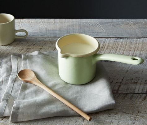 The Green Milk Pot, 4 inches tall and 4 inches wide, is available for $48 at Provisions via Ancient Industries Dining Ware, Milk Pot, Object Lessons, Crushed Glass, Green Enamel, Food 52, Kitchen Colors, Cooking Tools, Kitchen Items