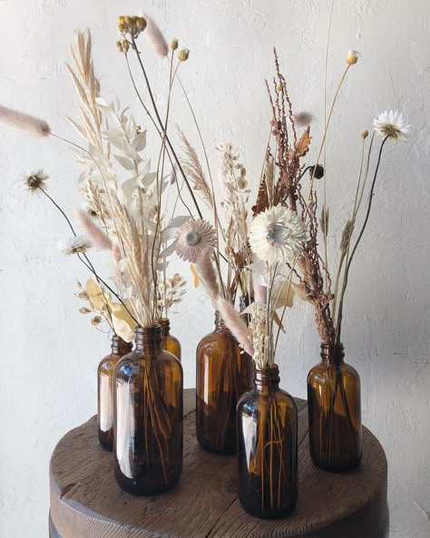 Brown Bottles Decor, Dried Flower Bottle, Dried Flowers In Bottles, Witchcraft Party, Apothecary Branding, Apothecary Store, Chalet Bedroom, Clear Wine Bottle, Easter 2024