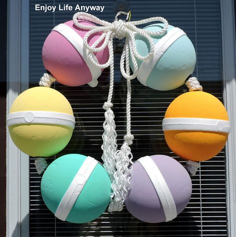 What says "coastal" more than this Painted Buoy Wreath? Full instructions with photos. Buoys Diy, Buoy Painting, Painted Buoys, Hammock House, Buoys Art, Buoy Decor, Beachy Farmhouse, Nautical Outdoor Decor, Nautical Bathroom Design Ideas