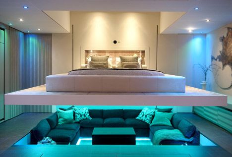 the master bedroom is lowered down over the sunken seating area of the living room ... Ikea Mandal, Futuristic Bedroom, Simple Bed Designs, One Bedroom Flat, Sunken Living Room, Dekorasi Kamar Tidur, Living Modern, Secret Rooms