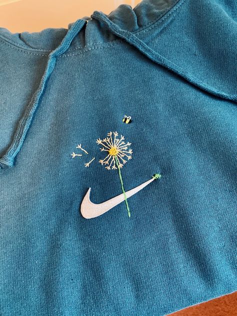 dandelion on nike hoodie embroidery design Nike Hoodie Embroidery, Embroidery Designs For Hoodie, Hoodie Embroidery Diy, Embroidery Hoodie Diy, Embroidery Hoodie Ideas, Nike Embroidery Sweatshirt, Hoodie Embroidery Ideas, Embroidery On Hoodies, Nike Embroidery Design