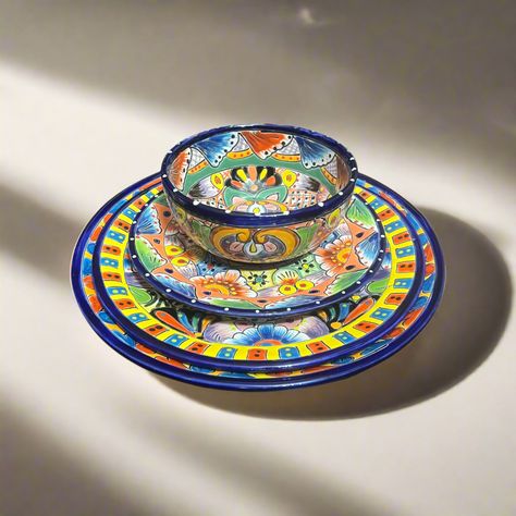 Welcome to our vibrant collection of handmade Talavera treasures! This stunning 24-piece Talavera Dinnerware Set is a true representation of authentic Mexican craftsmanship, bringing bold colors and intricate hand-painted designs to your dining table. It includes: (6) 11.5" plates, (6) 10" plates, (6) 8" plates, and (6) 5.5" bowls. STYLE: Inspired by traditional Talavera techniques, this dinnerware set showcases vivid patterns and a colorful palette that highlight the beauty of Mexican pottery. QUALITY: Each piece is carefully handmade by skilled artisans, making every set unique. While crafted for durability, please handle with care to preserve its artistic details. SHIPPING: We take pride in our secure, quality packaging to ensure your set arrives safely. If any issues occur during shipp Talavera Dinnerware, Colorful Palette, Painted Designs, Mexican Pottery, Authentic Mexican, Handle With Care, Dinnerware Set, Dining Experience, Bold Colors