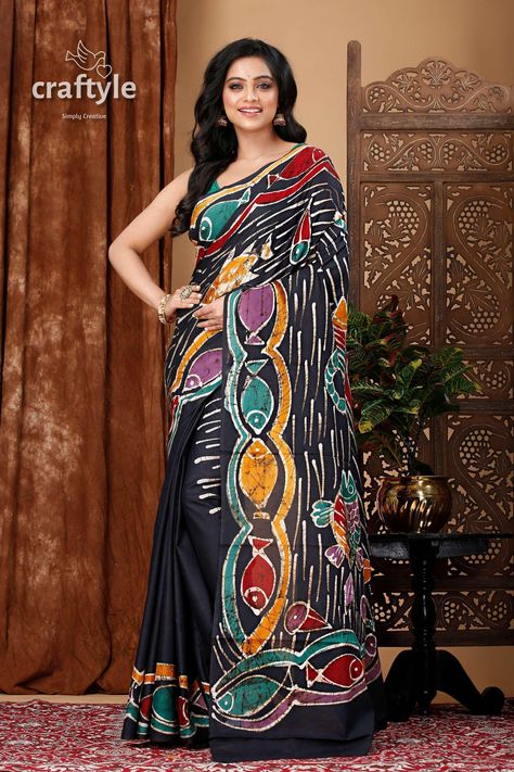 Indulge in the elegance of our handcrafted batik silk saree, a stunning embodiment of cultural heritage and artistry that showcases an exquisite aquatic design. This luxurious saree, made from pure cotton, drapes gracefully, offering not just a touch of sophistication but also an unparalleled comfort that is perfect for festive occasions or intimate gatherings. Each batik printed saree is an original painting, meticulously crafted to celebrate the beauty of traditional craftsmanship, making it a unique fashion accessory that stands apart.  Gift your wife or a loved one this exquisite piece and allow them to experience the softness and allure of our ethnic saree collections. The included running blouse piece enhances versatility, enabling a tailored fit that elevates your ensemble to new he