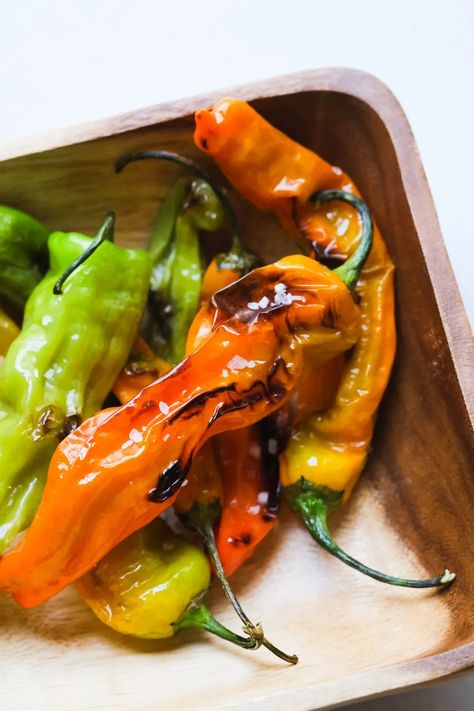 These blistered shishito peppers are the perfect healthy snack for any type of occasion! You can easily make this blistered shisito pepper recipe in just a few minutes using your cast iron skillet. Here's how to blister shishito peppers. #shishitopeppers #blisteredpeppers #appetizerideas #snackideas #snacks #appetizers #castironrecipes #castiron #skilletrecipes #healthysnack Blistered Shishito Peppers, Shishito Pepper, Shishito Peppers, Sweet Pepper, Japanese Sweet, Pepper Seeds, Perfect Game, Tall Plants, Iron Skillet